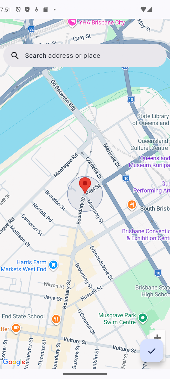 Map view with a search bar and a dropped pin marking a chosen location